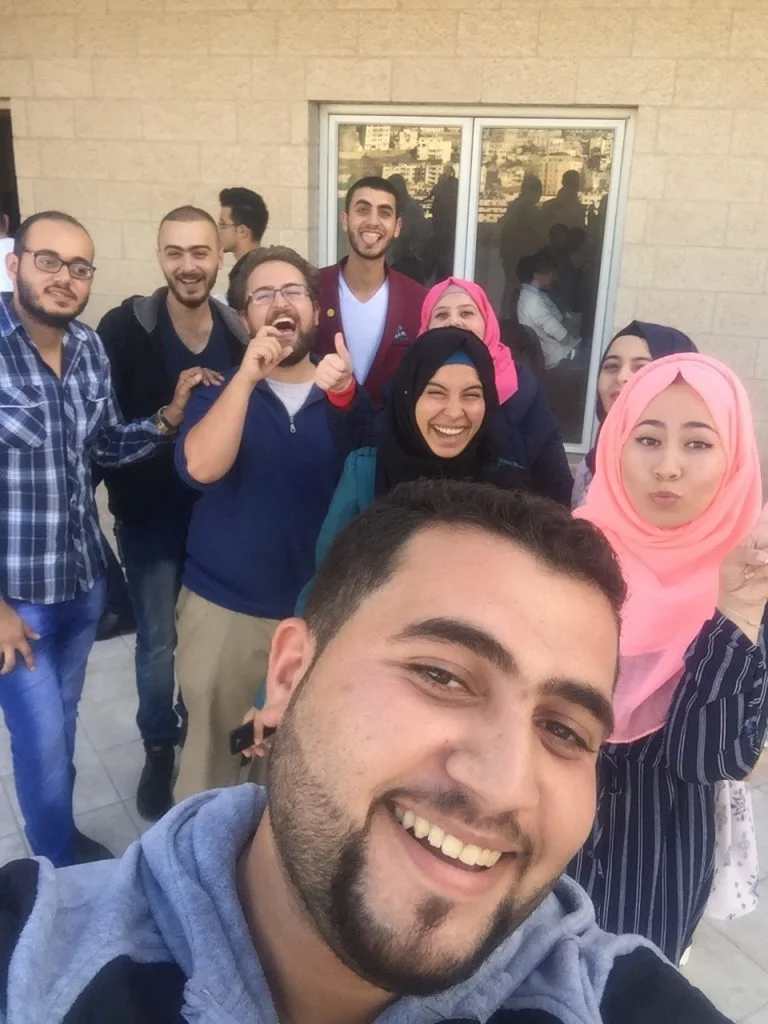 EFL Fellow Mike and his EFL class get a few laughs in following the mid-session celebration.