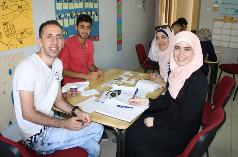 Students of the STEP! II EFL class learn language skills and experience cross cultural connections with TYO international interns and fellows.