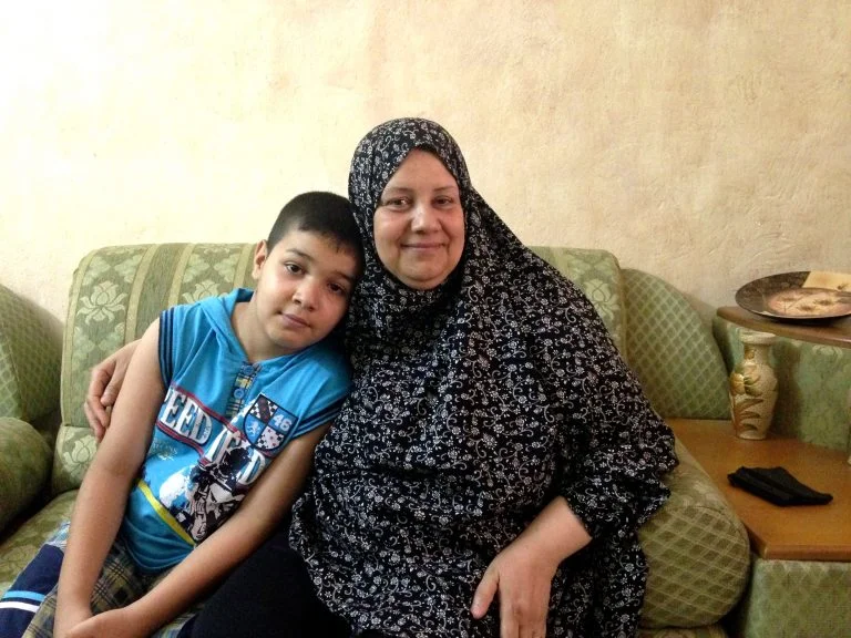 Maha, a committed mother in TYO’s women’s empowerment programs, and her son Malik in his fifth and last year of the Core early childhood program.