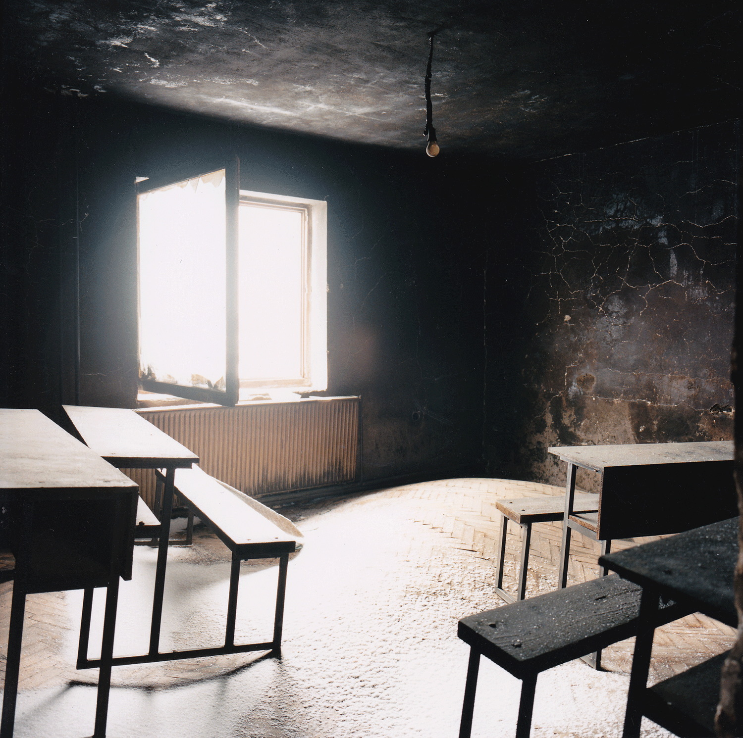  Schoolroom, Prishtina, September 30, 1999. “Before the war, I was constantly looking out of the window, terrified that the police would come and kill my husband and my family because of the school. Now it is time to work and rebuild, Ishalla. We’ll 