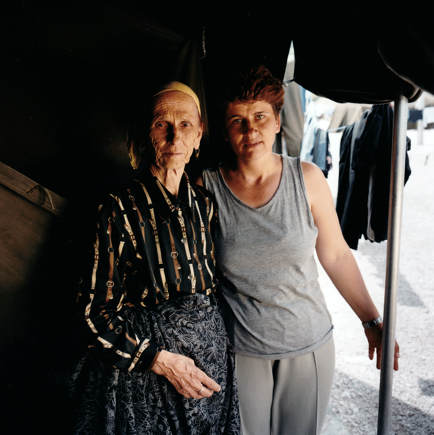 “…We walked to the border, with police and paramilitaries constantly threatening to shoot us. Sometimes my brother carried my mother in a blanket; sometimes I supporter her on one arm while I carried a twenty-kologram bag with the other. I could ha