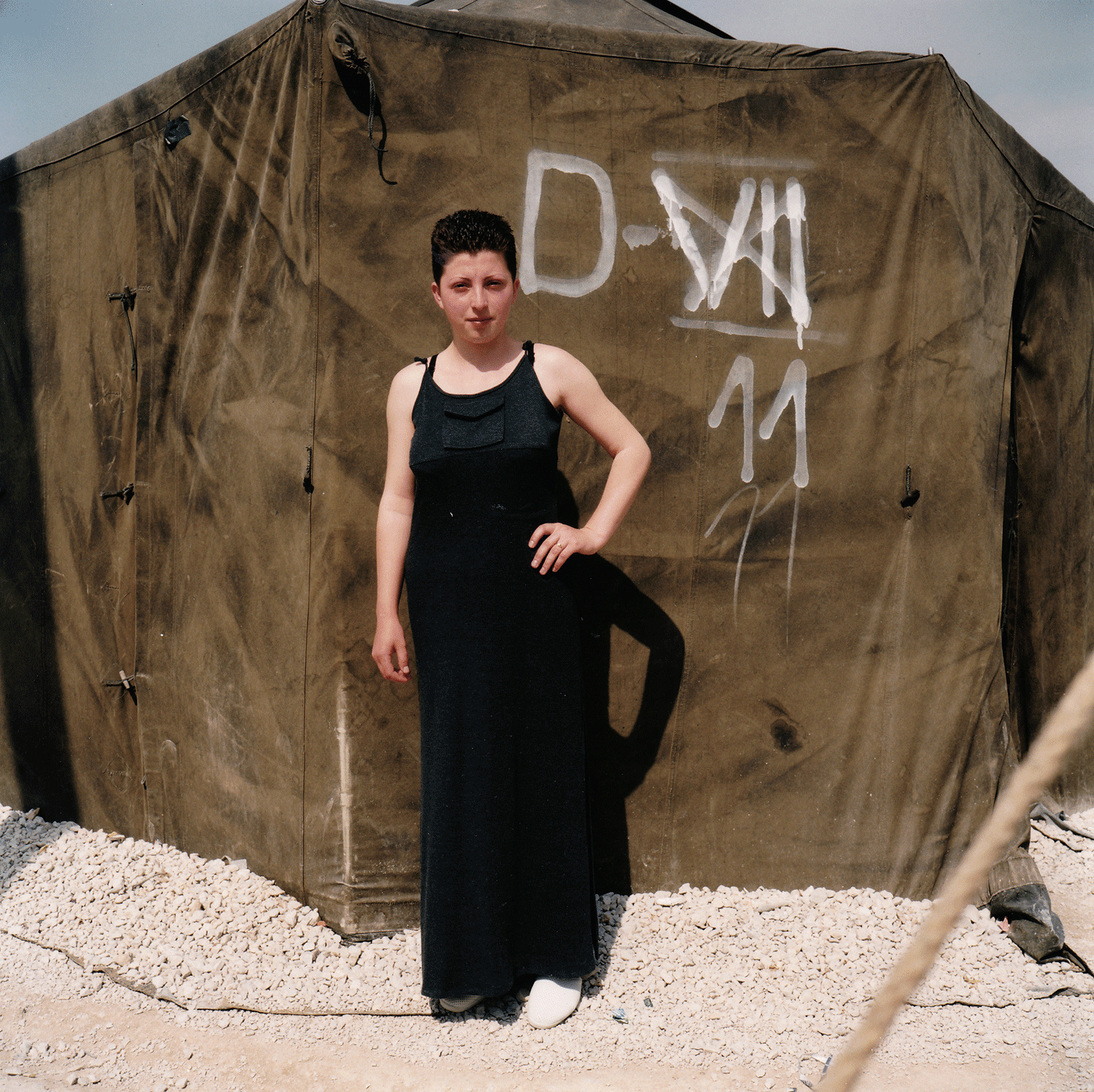 Mimoza, age 20 Neprosteno camp, Macedonia, May 11 1999. “Why did I buy this dress? Well, it was very hot, and I’d had several dresses like this, which I’d had to leave behind in Kosova. So when I went to Tetovë on my visit out of the camp, I bought it, I wanted to make myself feel better. I’m a classical singer, but I had to leave all my music behind. We had to leave the family violin, our books, all our family photos. I like choral music and sonatas – Bach, Schumann, Chopin, but Mozart’s my favourite. I would like to sing in the camp, but there’s no privacy.”