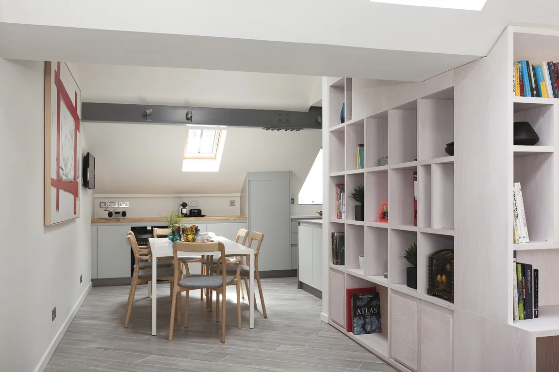 bookcase dining area skylights and art
