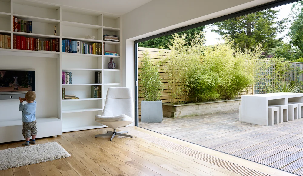 open plan living area spilling out to garden