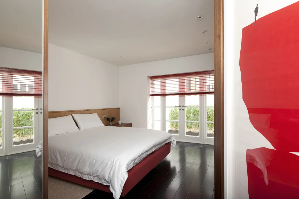 bedroom and red art