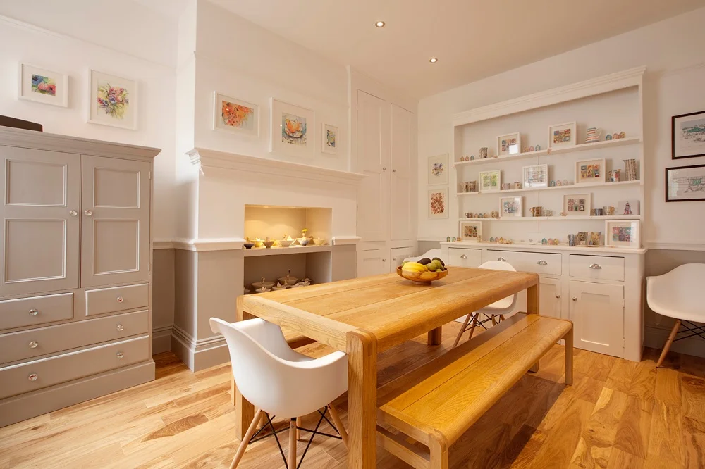 dining room with bespoke joinery and eames chairs