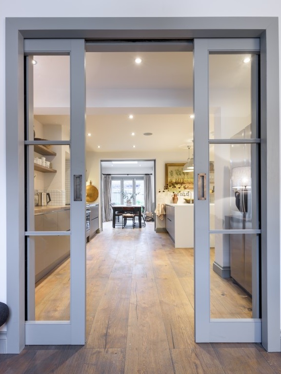 modern pocket doors and revamped kitchen