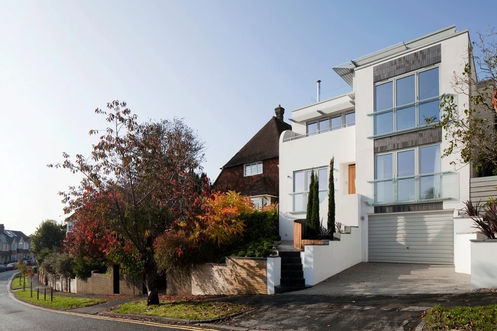 bungalow with two new floors added as a contemporary addition to the streetscape