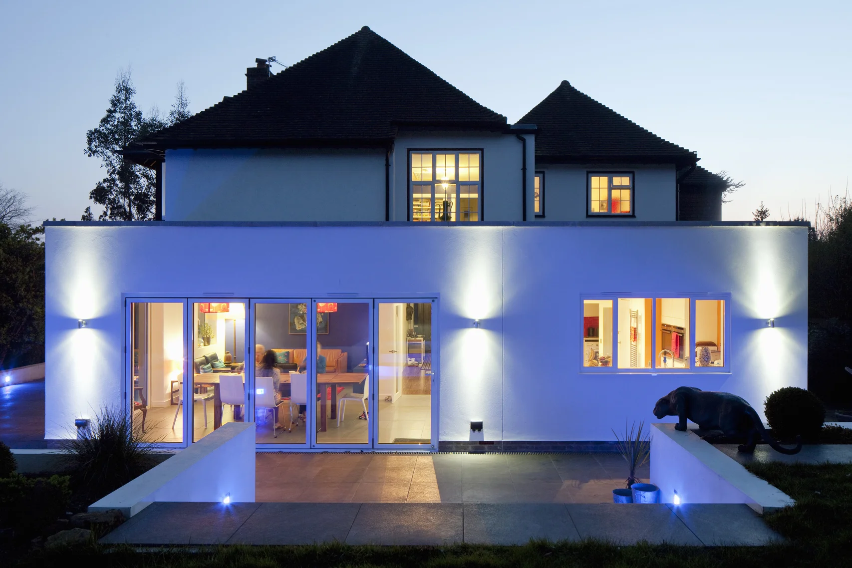 rear view of single storey extension at night