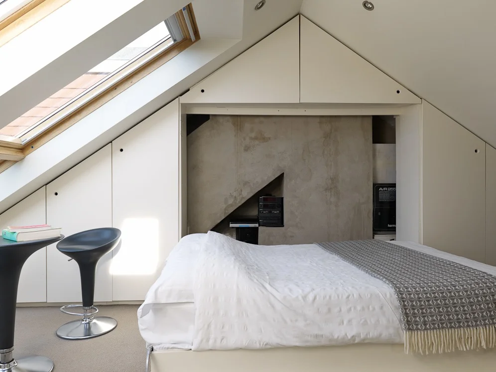 loft conversion creates fourth bedroom skylights bring in light