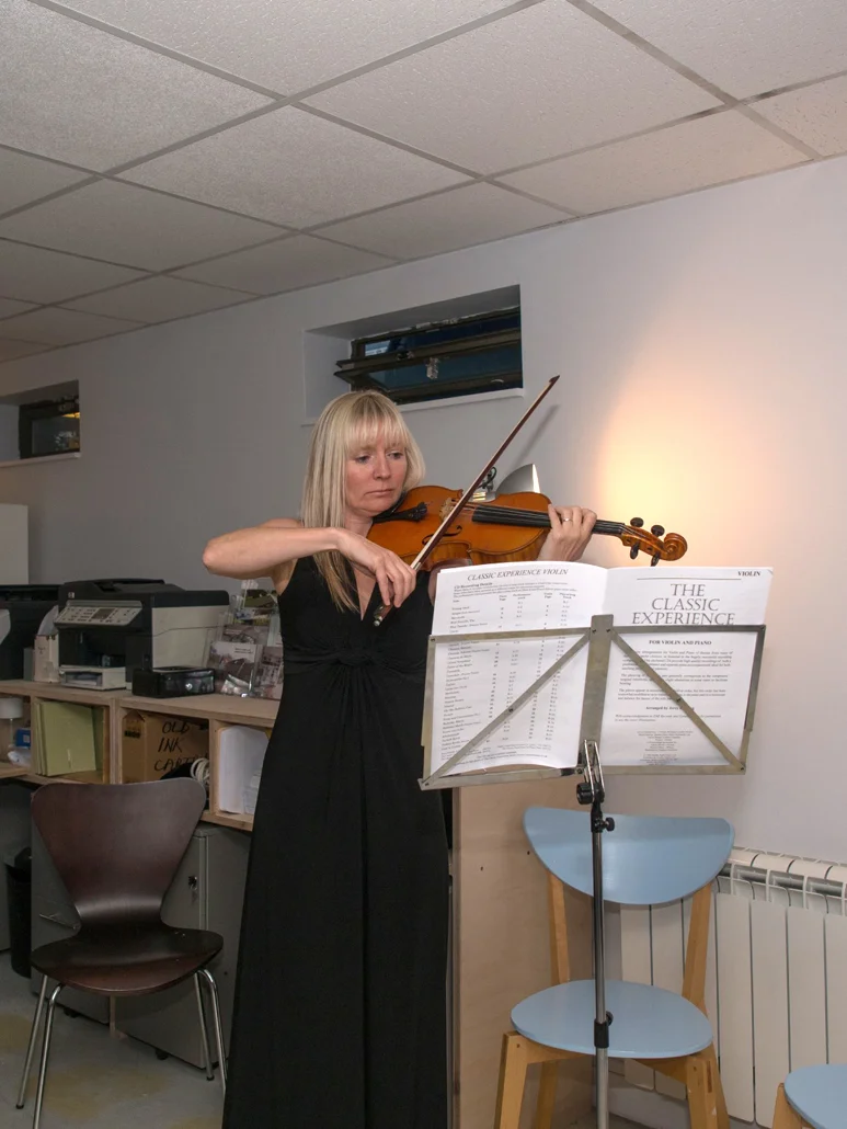 archangels celebrates five years anita plays the violin