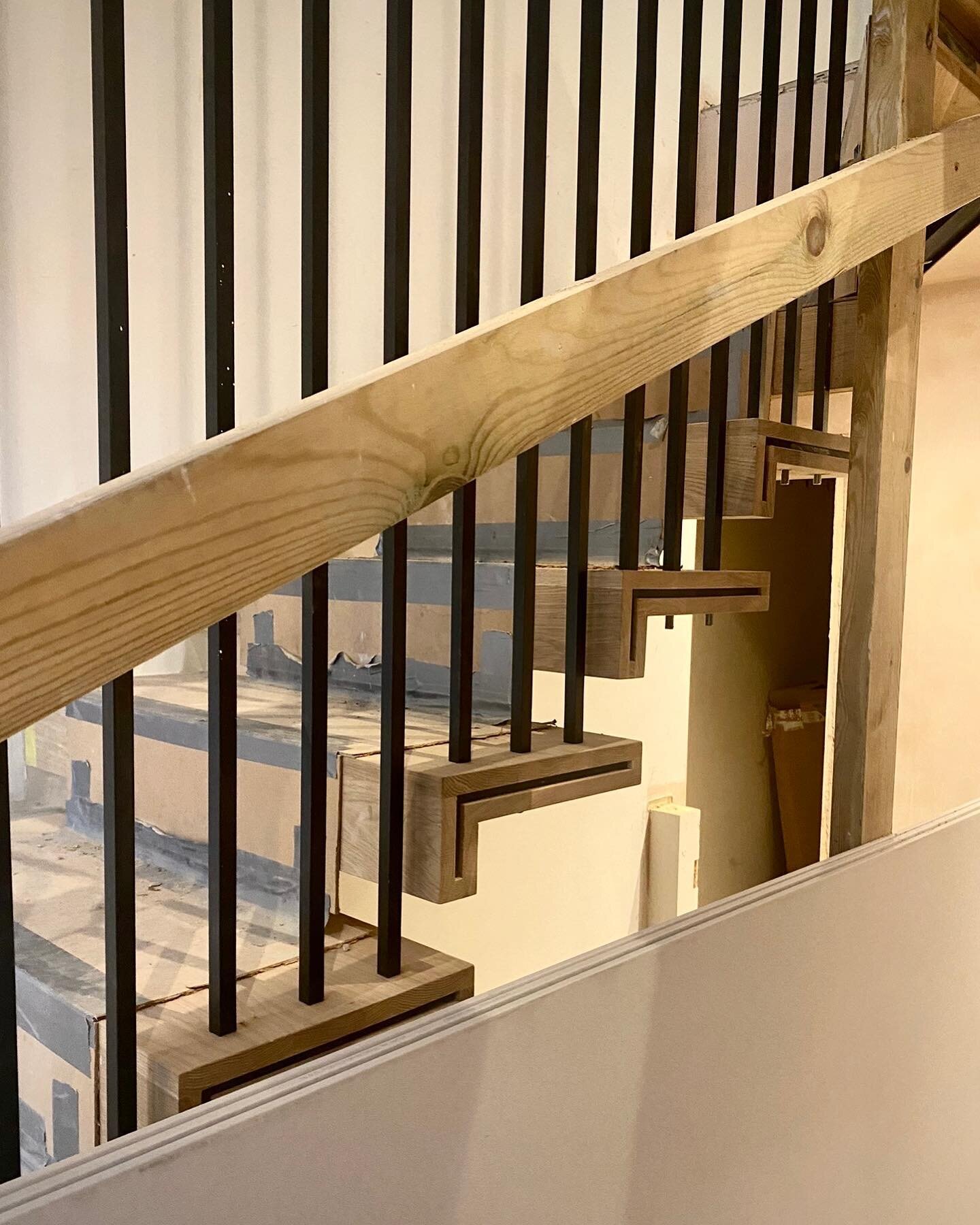 Our timber and steel staircase is taking shape! 

With built-in LED lights in the stairs and black steel poles running alongside, this modern staircase helps to make a great first impression when entering this private home.

You can see the developme