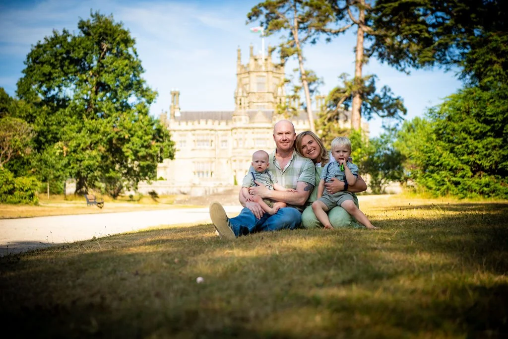 Children playing in the grounds of Margam Abbey during an outdoor family session
