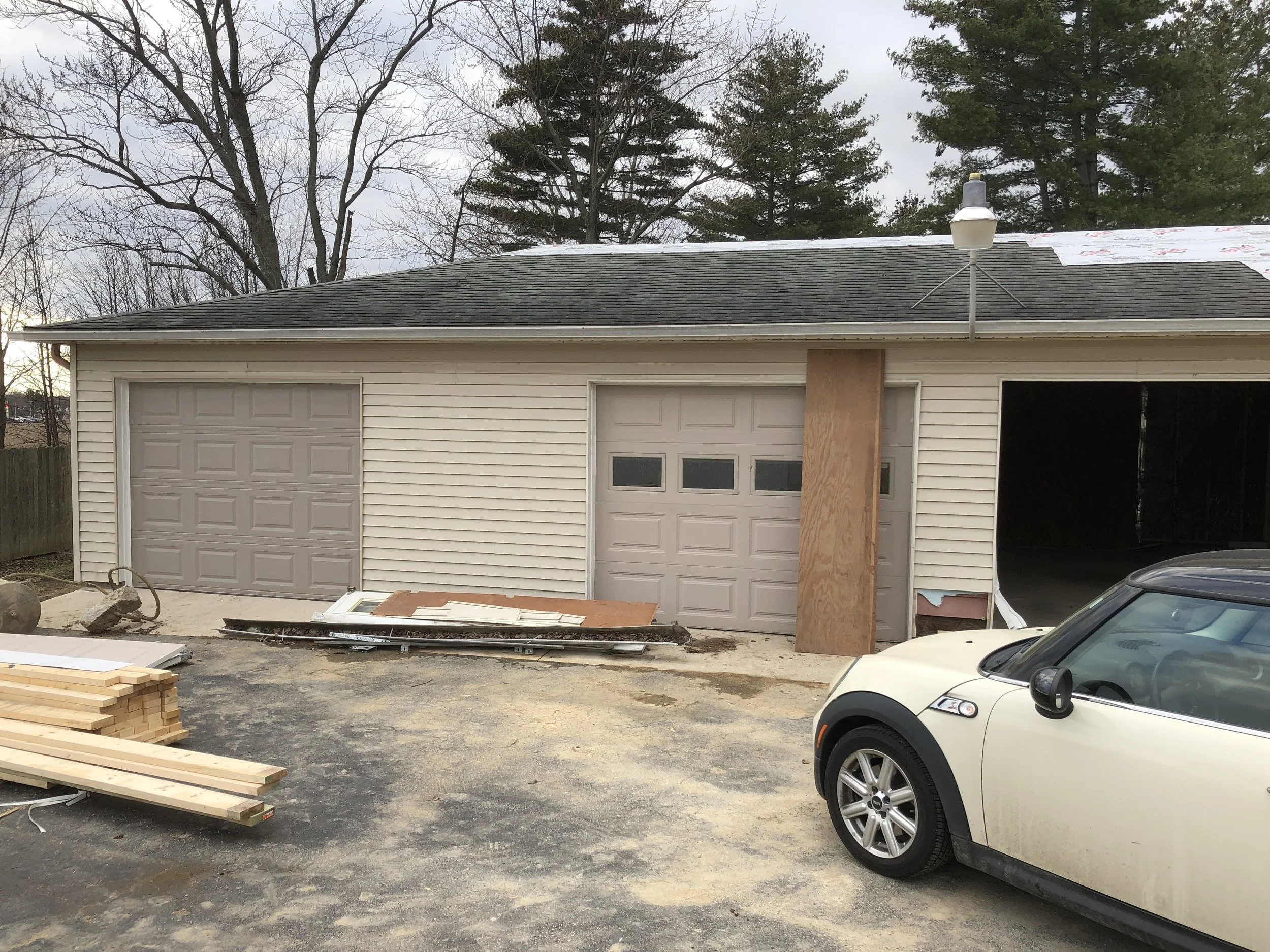 before (asphalt and flat roof line)