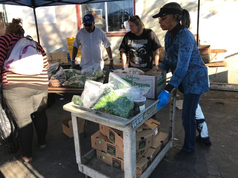 Nelly, founder of ECAP, and the community she serves.