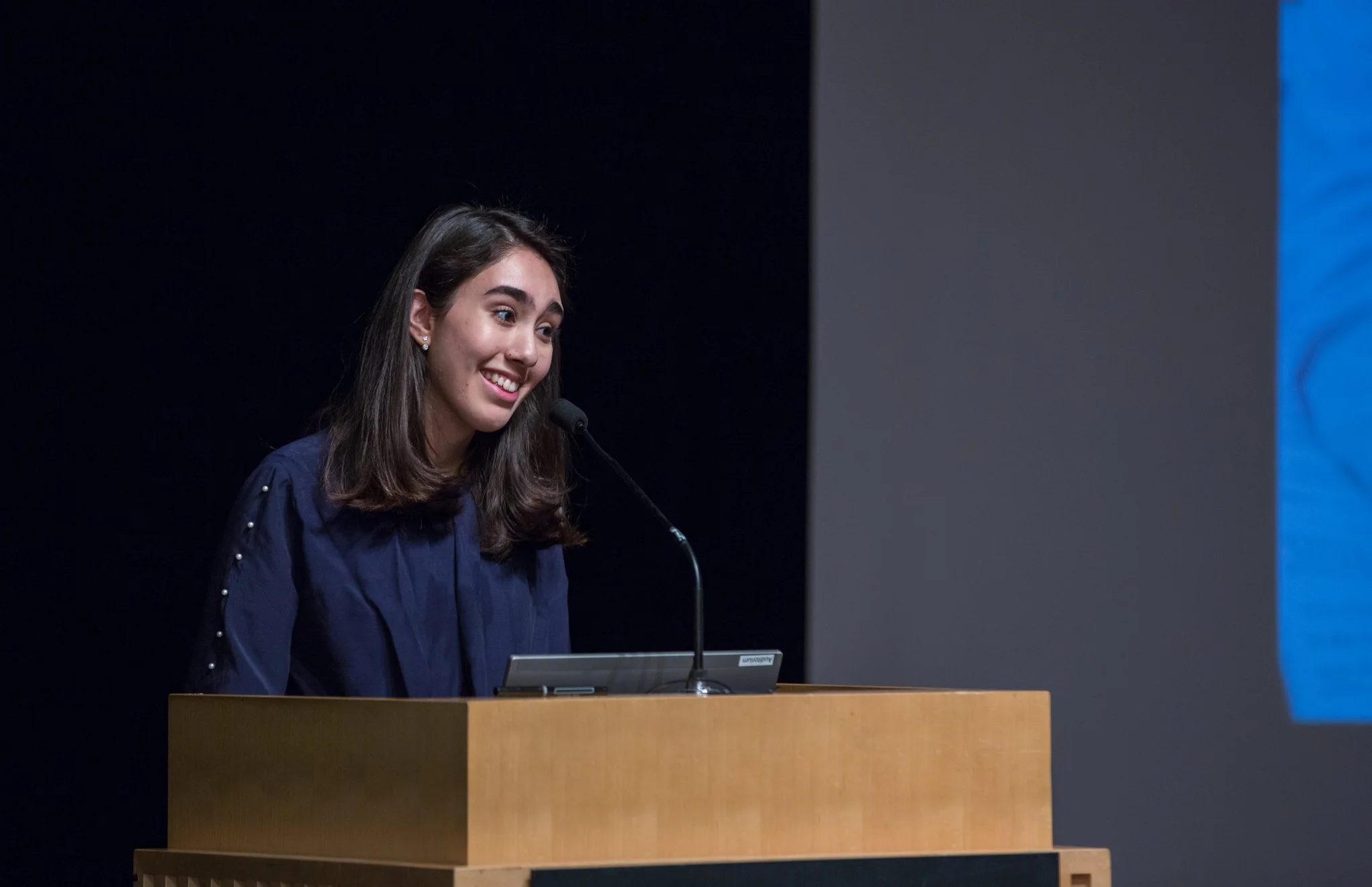 Maryam acting as emcee for WFWPI’s CSW62 Side Event