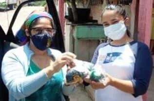 WFWP Honduras Distributes Sanitary Products and Food Supplies for Those in Need