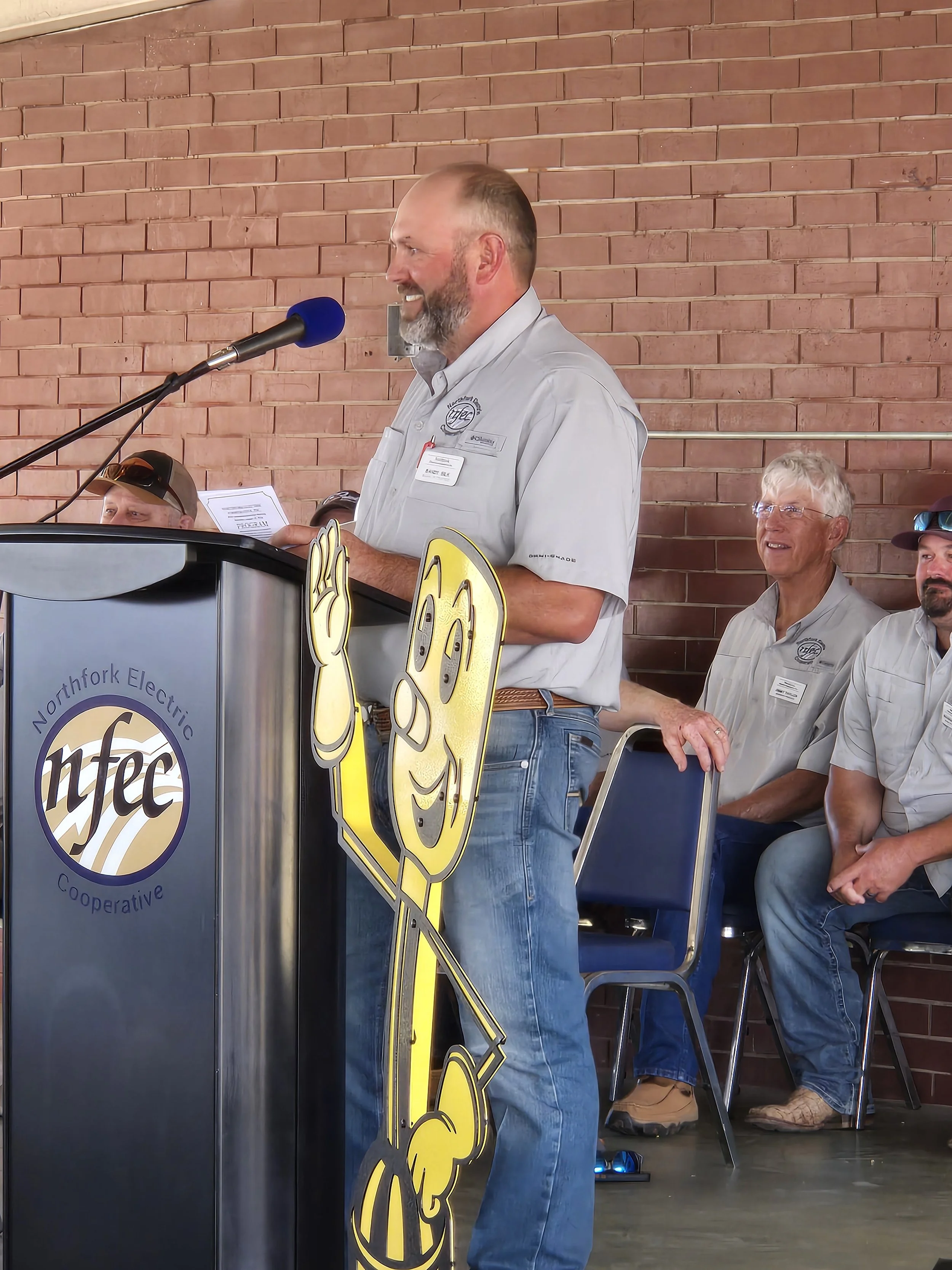 Bandy at podium.jpg