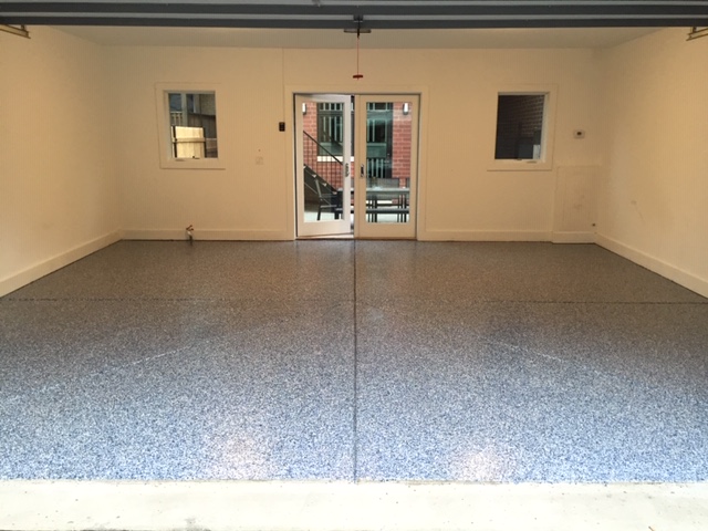 Epoxy flooring added to single family home garage before the home owners fully moved in