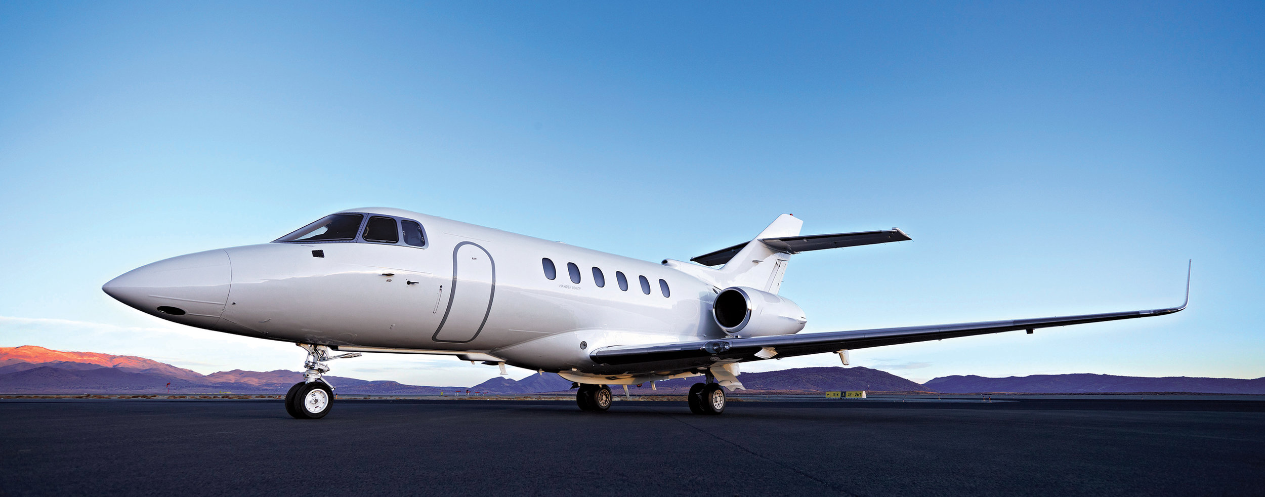 Hawker-800XP_Mid Jet_Exterior-2_Legacy_Aviation_Private_Jet_NetJets_Jet_Charter_TEB_VNY_MIA_PBI_FRG_SFO_FLL_FXE_BED2.jpg