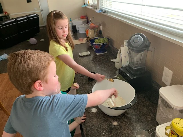 I wish I had sound on this picture. My kids love to count to three and toss all their ingredients in at the same time. If only you could hear the giggles.