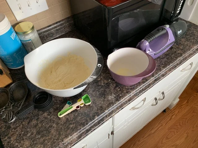 This is what your batter should look like. Please note my trusty ol’ handheld vacuum to the right. A moms best friend and sucker of flour, baking soda, and dry ingredients.