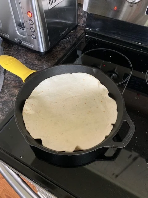 Heat up some tortillas. I use both corn and flour depending on my mood.