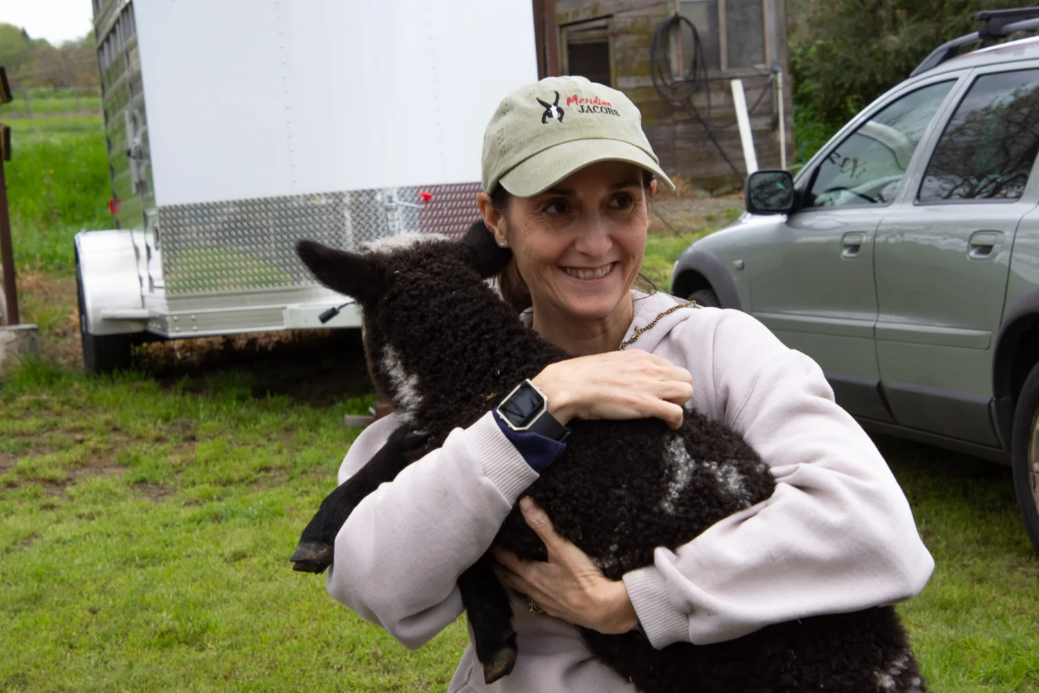 Farm Club member with lamb