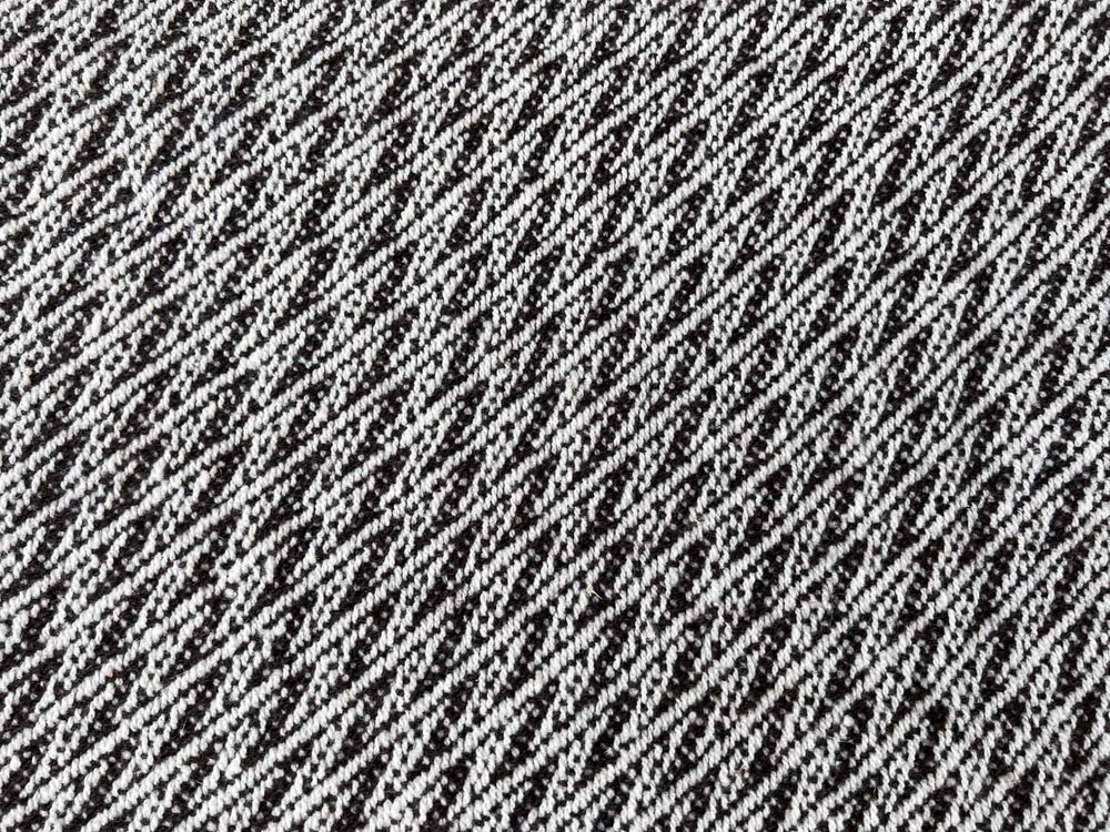 Diagonal Interlocking G stars wool blanket in black and white