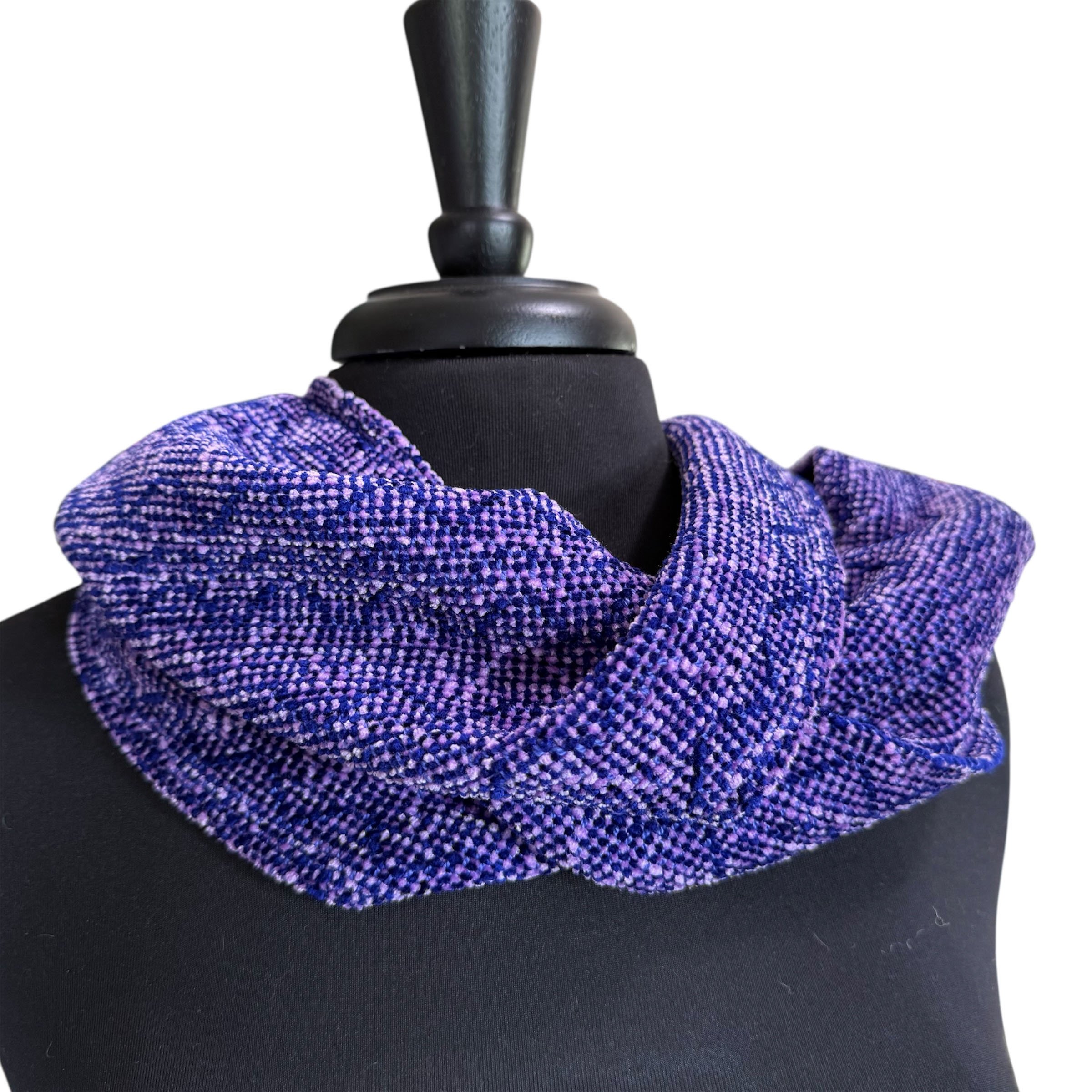 Purple rayon chenille scarf on black mannequin.