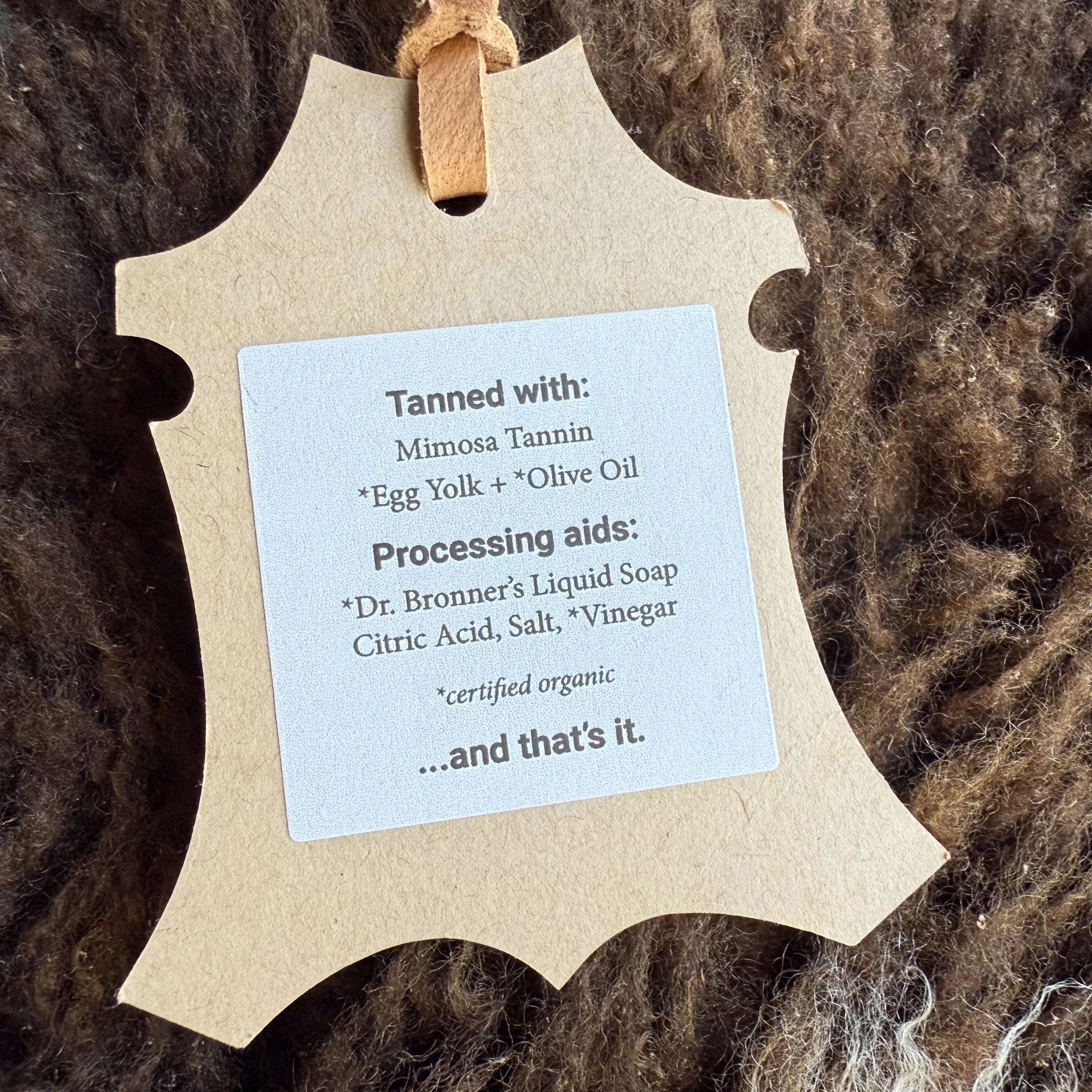 Tag showing processing info for lambskin.
