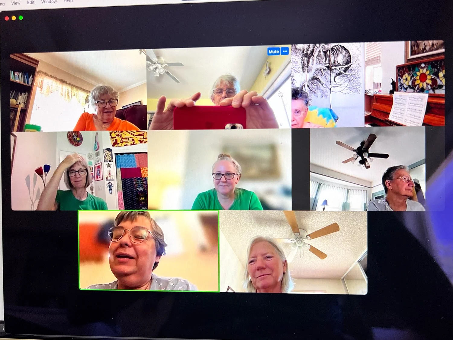 View of computer screen showing 8 participants in a zoom meeting.