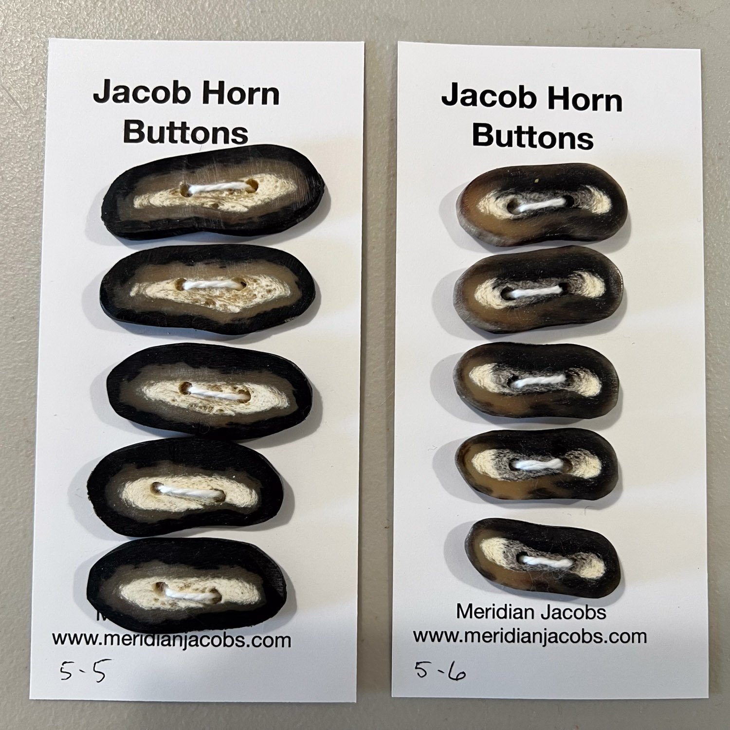 Jacob horn buttons on two cards in sets of five.