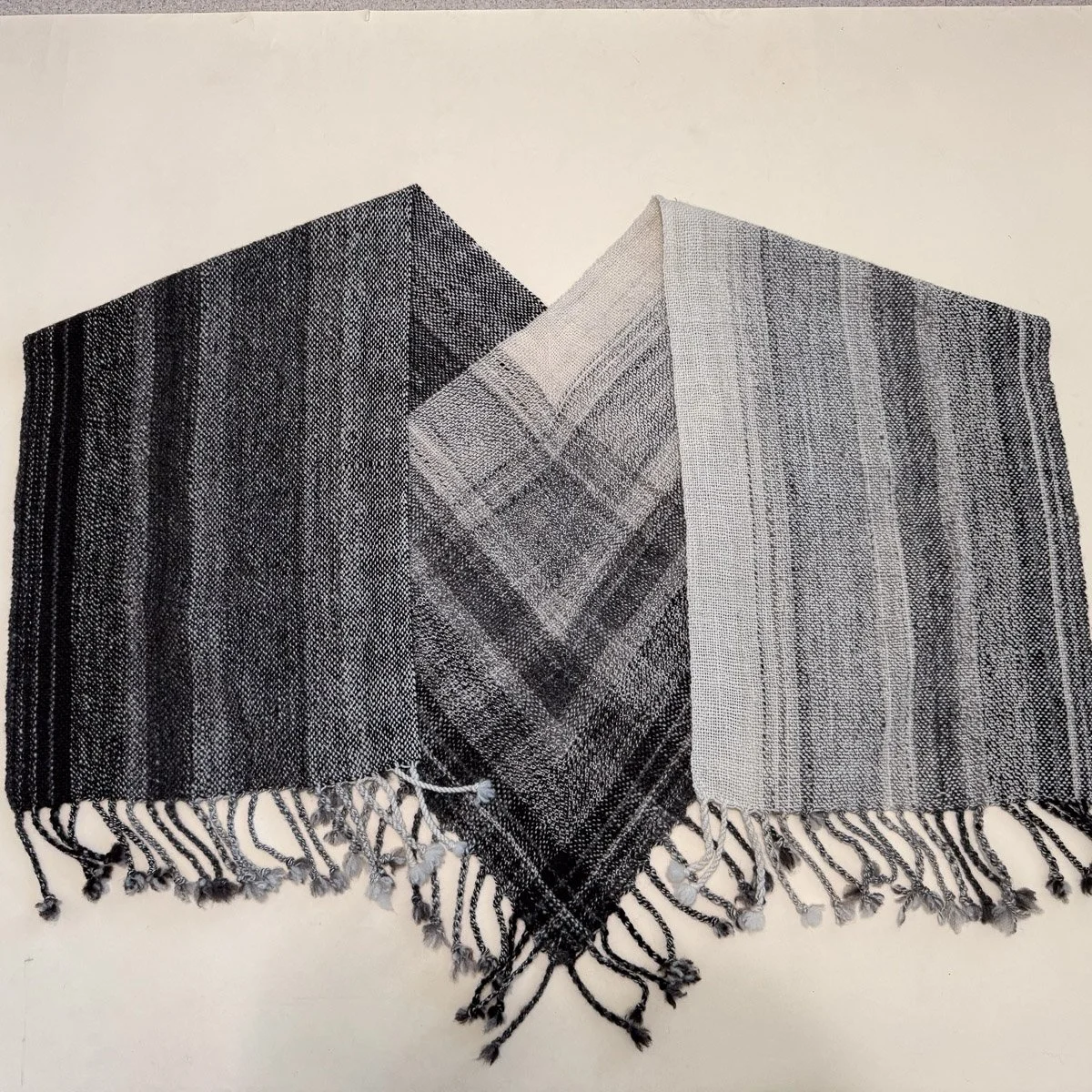 Wool shawl in natural colors of white, gray and black.