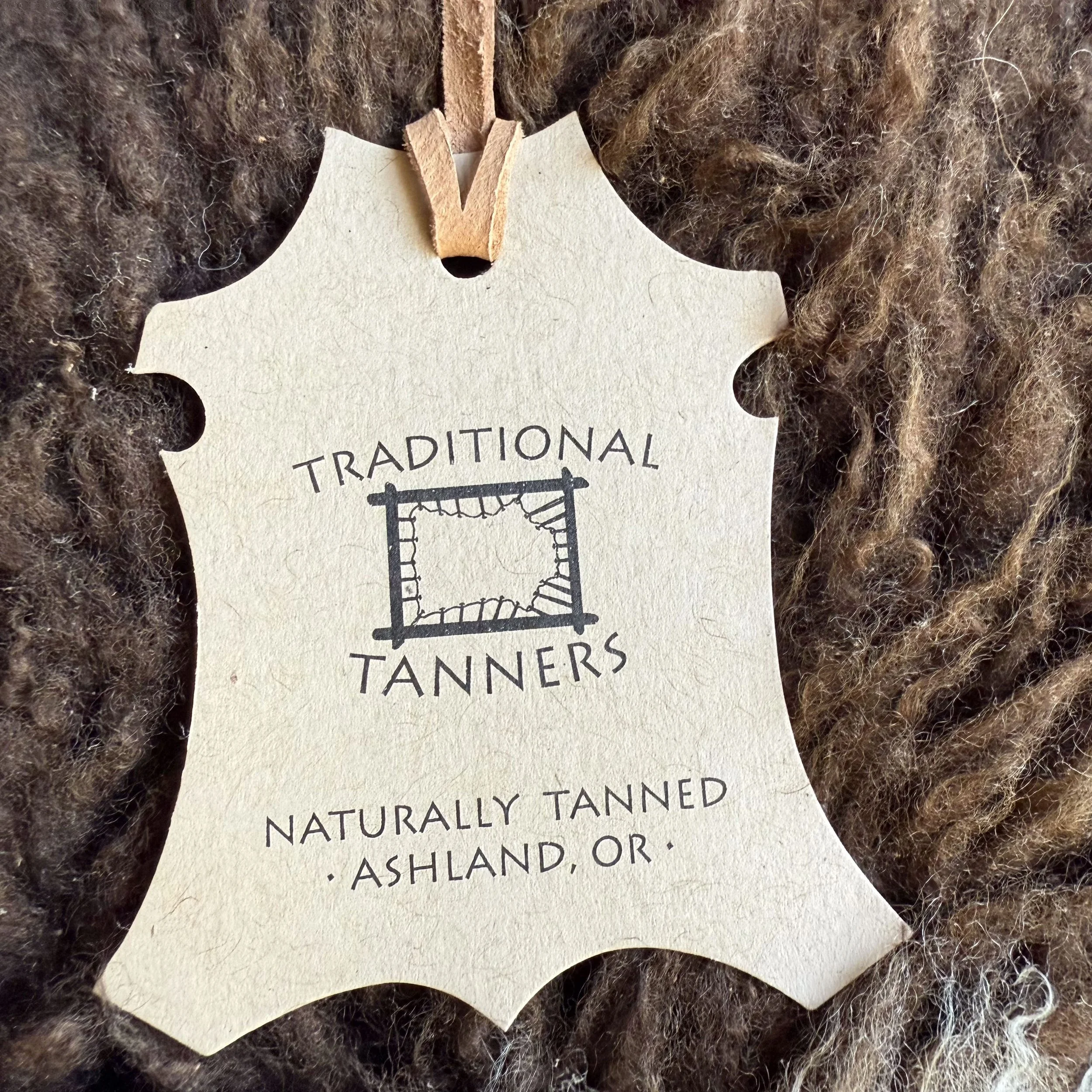 Tag with processor info on lambskin.