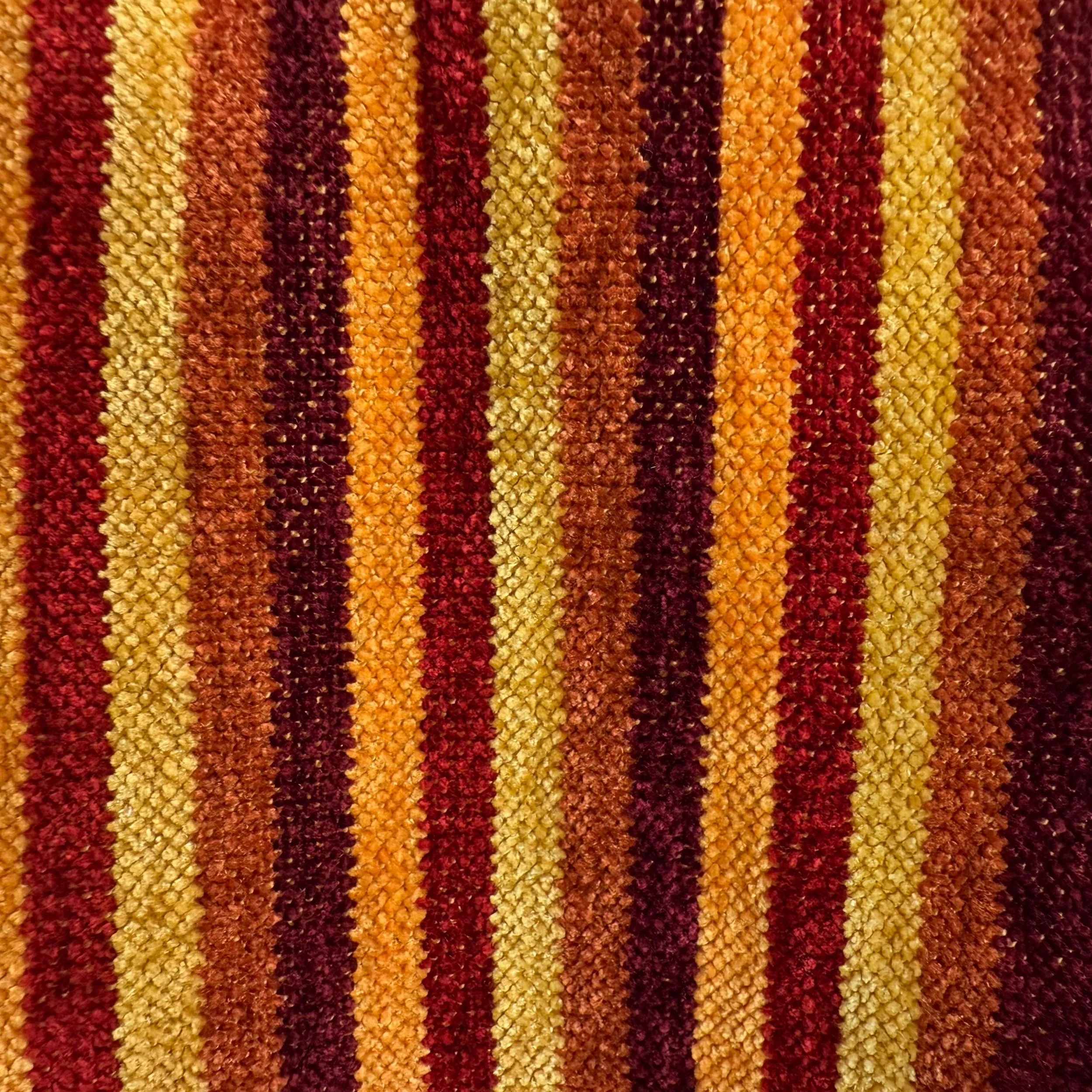 Close up of chenille scarf in fall colors.