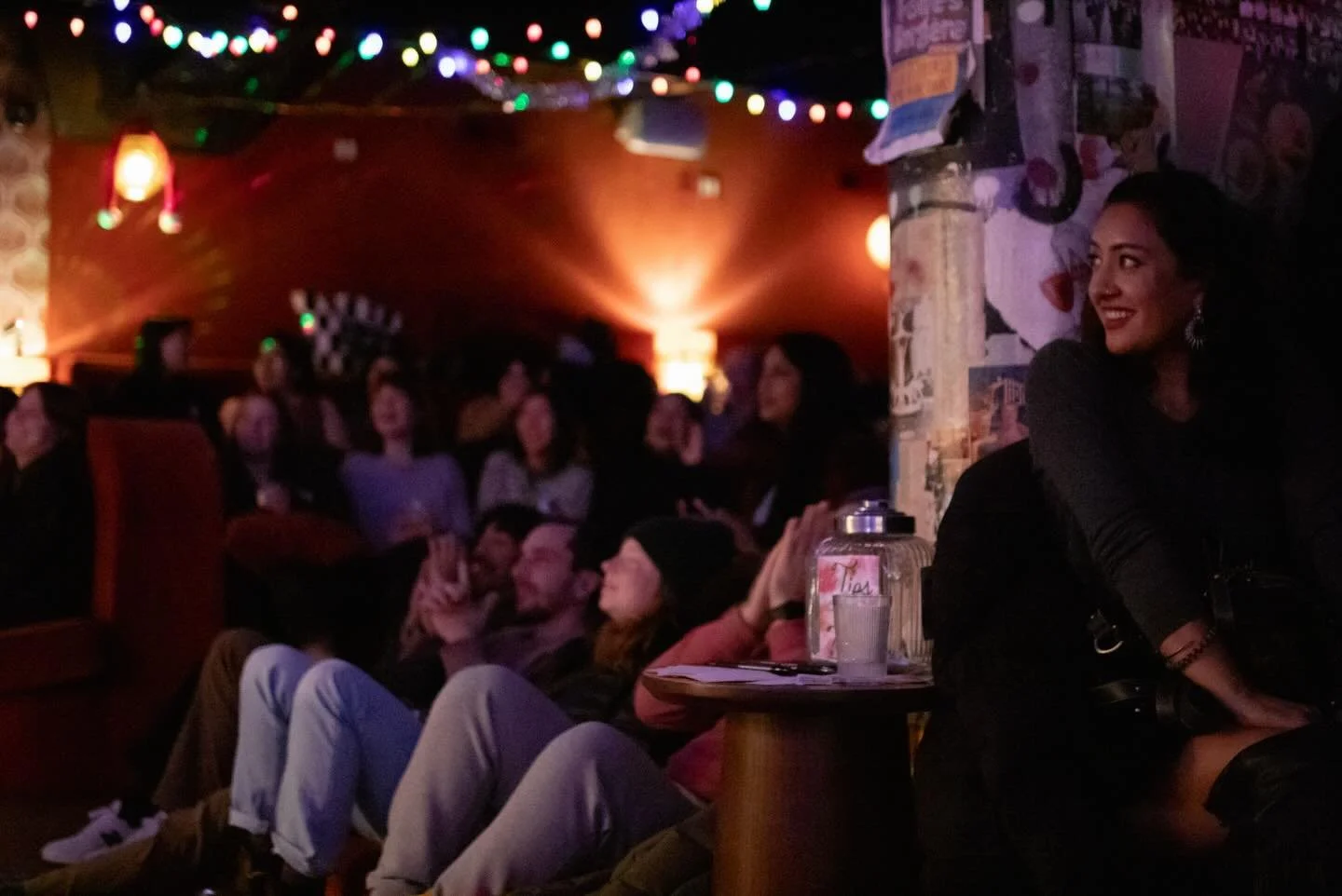 One year of incredible comics. ⭐️ 
One year in the most luscious, sapphic hideout. 🪩 
One show at the gayest beach! 🏖️ 

One parade, countless hangs, too many cheeseballs, producer meetings only at dive bars, so many photo strips, new queer connect