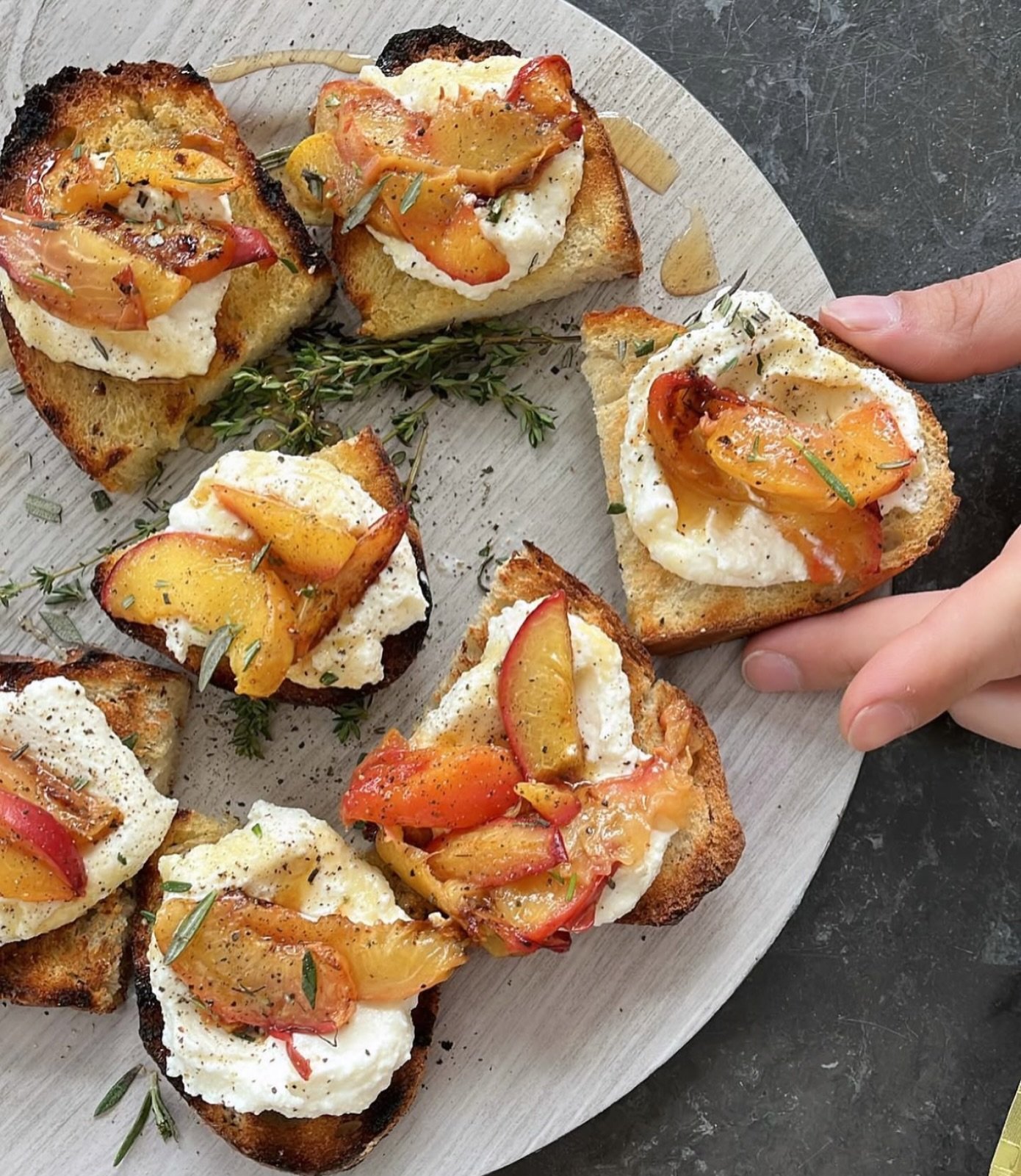summertime dinner parties are my love language&mdash;think grilled peaches and homemade ricotta on crostini, the breeze coming off the saltwater, seagulls calling overhead, friends laughing with their favorite drink in hand. i *literally* bring the r