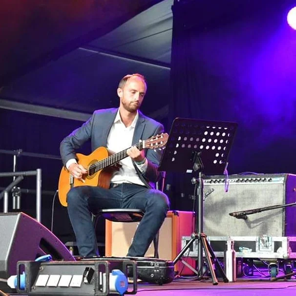 Performing on the main stage at Cambridge Folk Festival with Melissa James. Photo by Aaron Parsons.