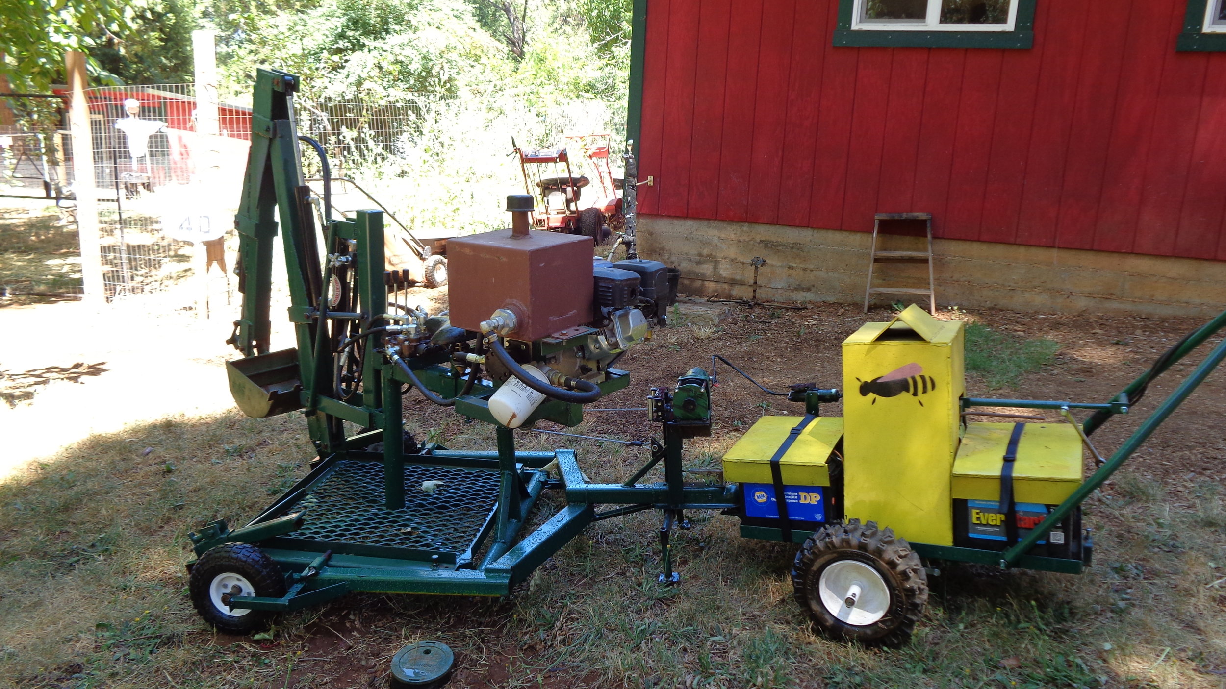 Backhoe next to shop with Worker Bee 1.JPG