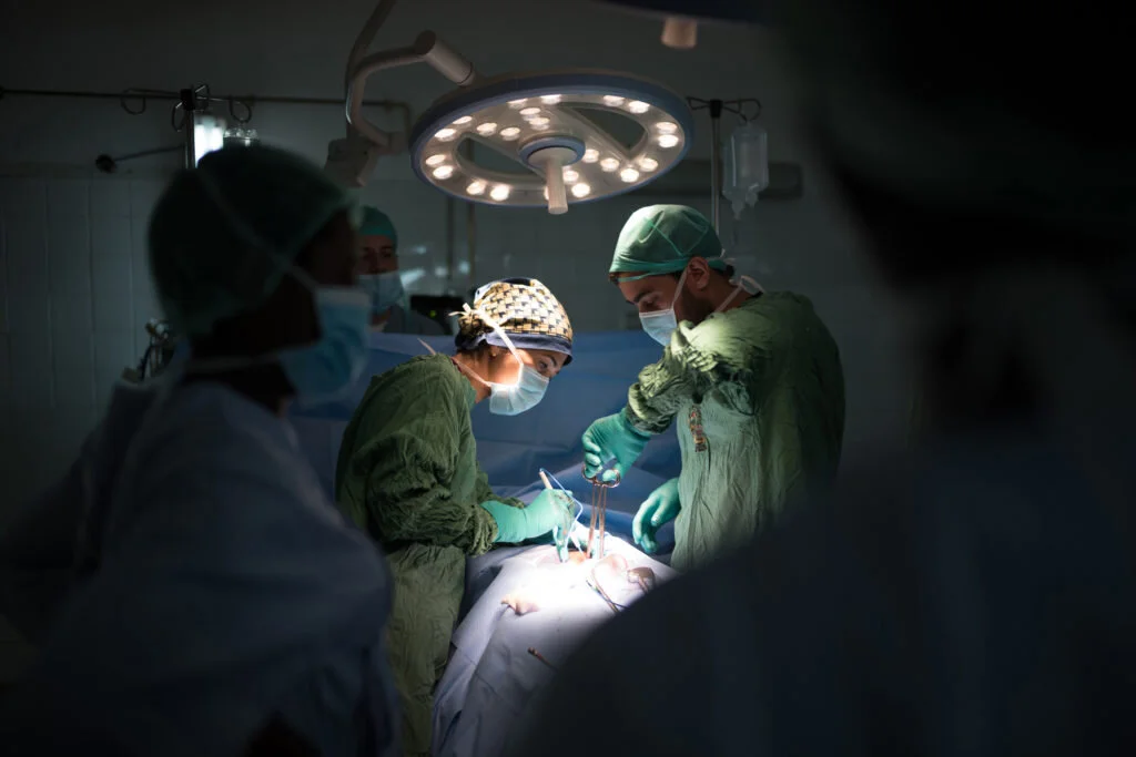 Doctors performing life saving care.