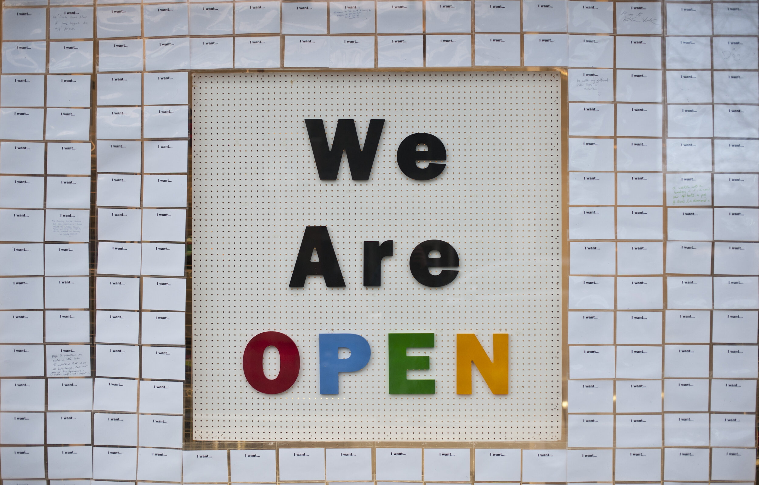  a ‘We are open’ sign. 