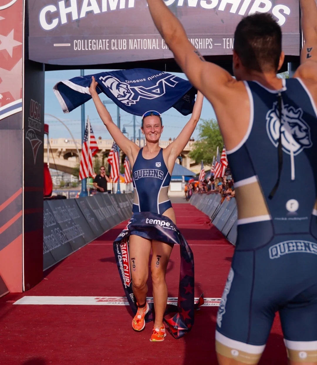 Anabel Knoll, Queens University, crossing the finish line first in the Mixed Team Relay (Photo: Full Send Triathlon)