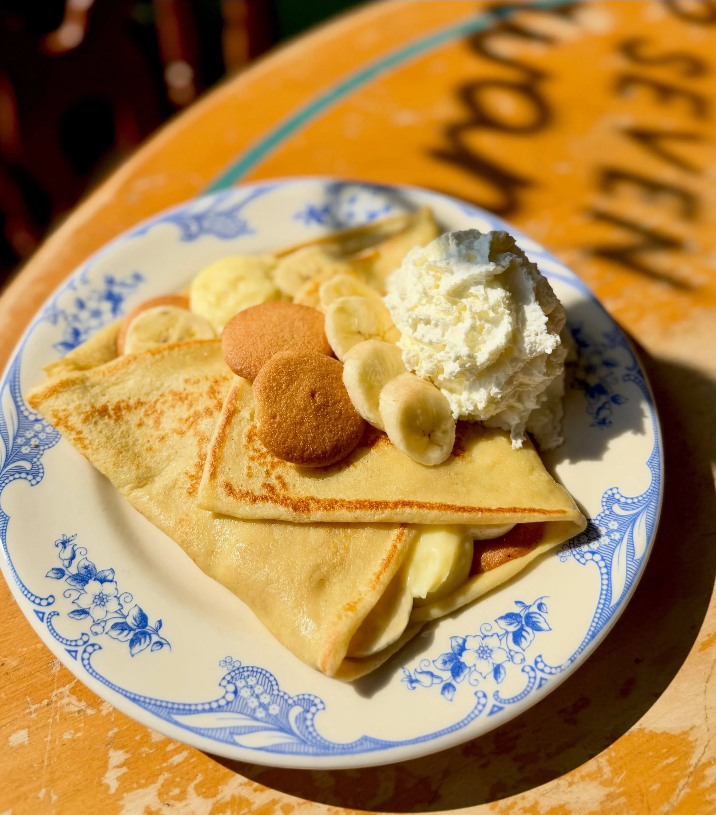 Banana Pudding Crepe - it's everything from the soft 'nilla wafers to the creamy vanilla pudding, sweet slices of banana and the fresh whipped cream ..... 🍌 run and get this one before our summer menu goes away!