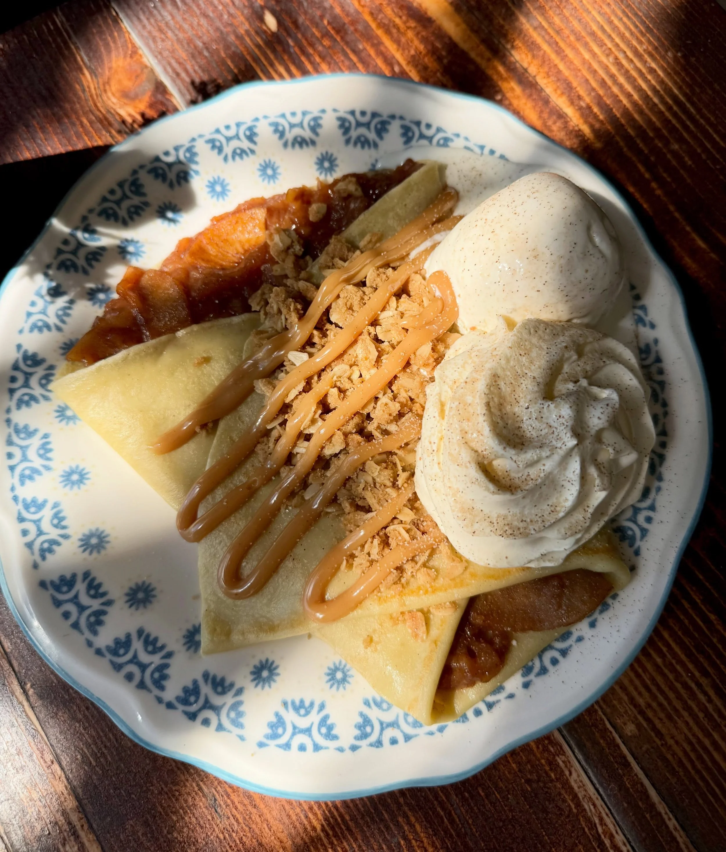 Browned Butter Apple Crisp 

Old favorite got a little glow up! Our house made apple compote is drenched in browned butter caramel, sprinkled with oat crumbles and a scoop of @fairwaycreamery madagascar vanilla ice cream and fresh whipped cream. 
One