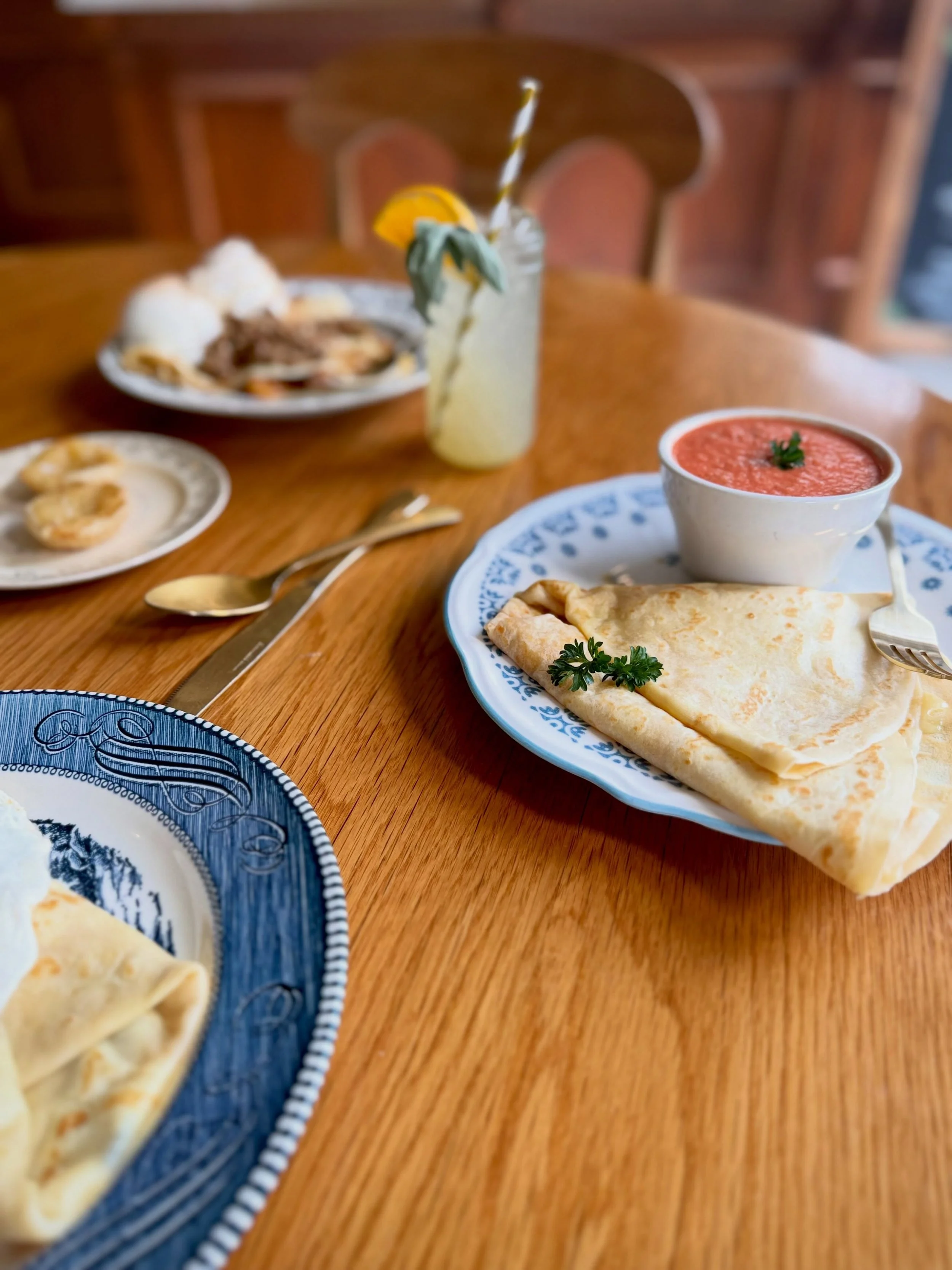 fall menu is in full swing! our tomato + basil is hot and cheesy and full of that cool morning warmth. 
 house made tomato basil soup, vegan of course, is also available by the cup/bowl. three cheese crepe is perfect for dipping!