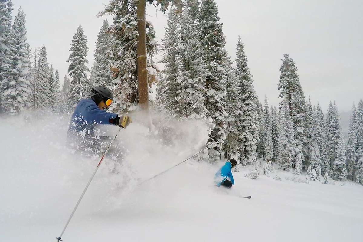 Skiers enjoy the plentiful snow at the Northstar at Tahoe resort, which reported a 28-inch base after early December storms. It is one of the Vail resorts and offers discounts for buying lift tickets in advance.