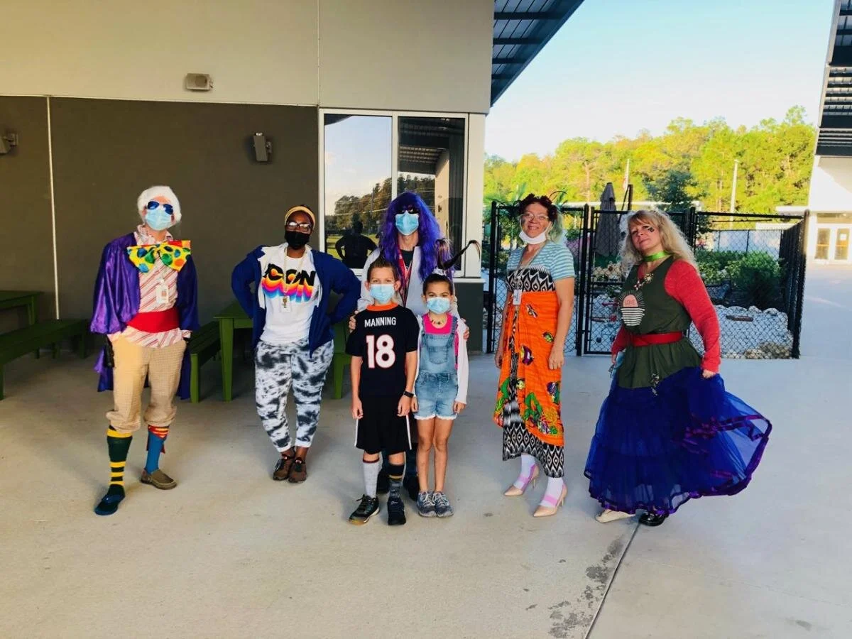  Monique Rothe with students on spirit week. 