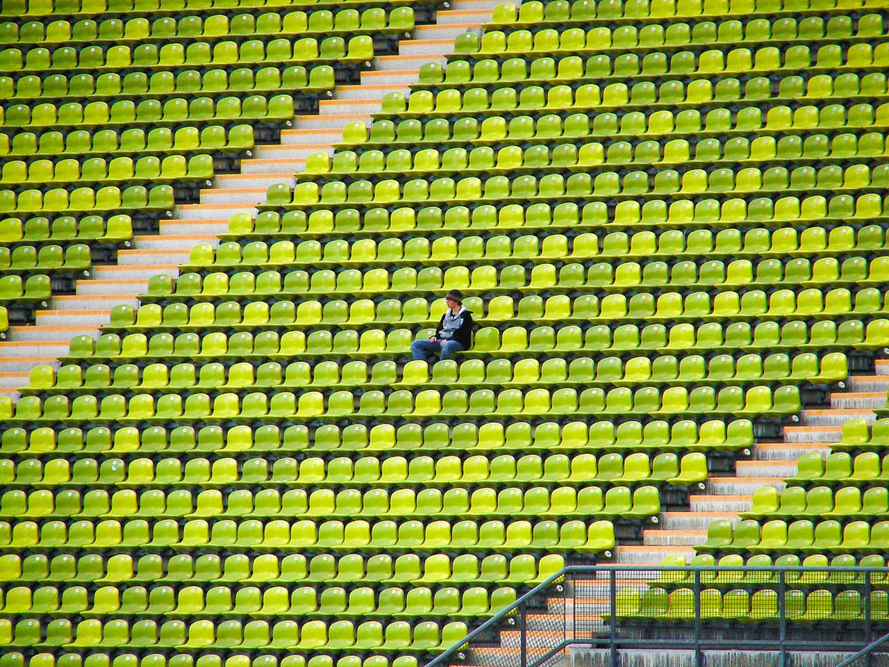 single person sitting in stadium alone.jpg