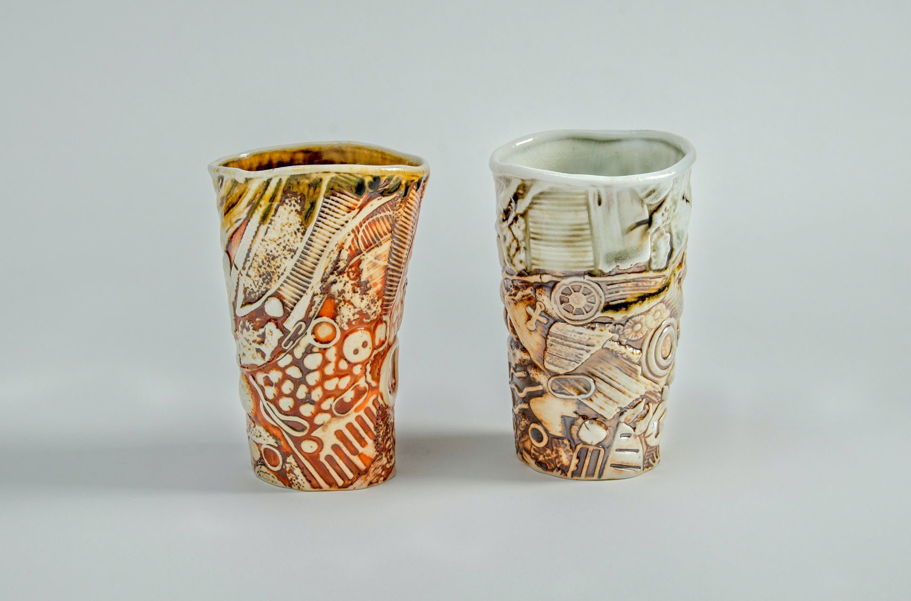 Two Fossil Tumblers